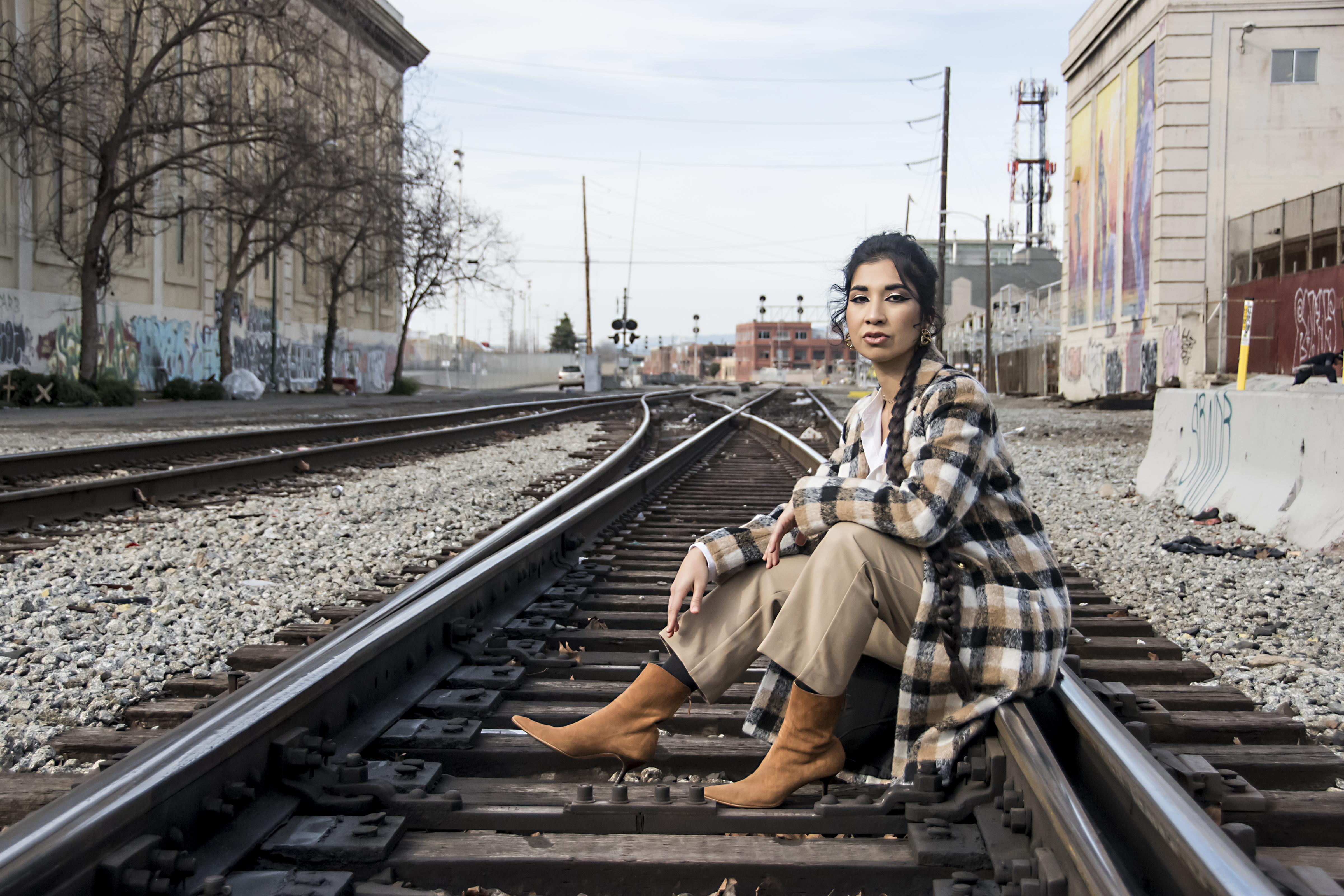 Ruby Mountain's couture look rooted in Afghan heritage, set against an Oakland backdrop.